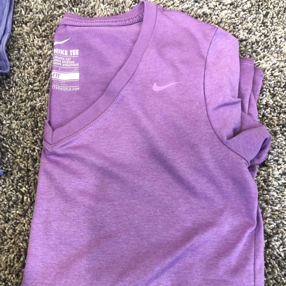 like new, Nike light purple athletic cut Dri-fit size small
